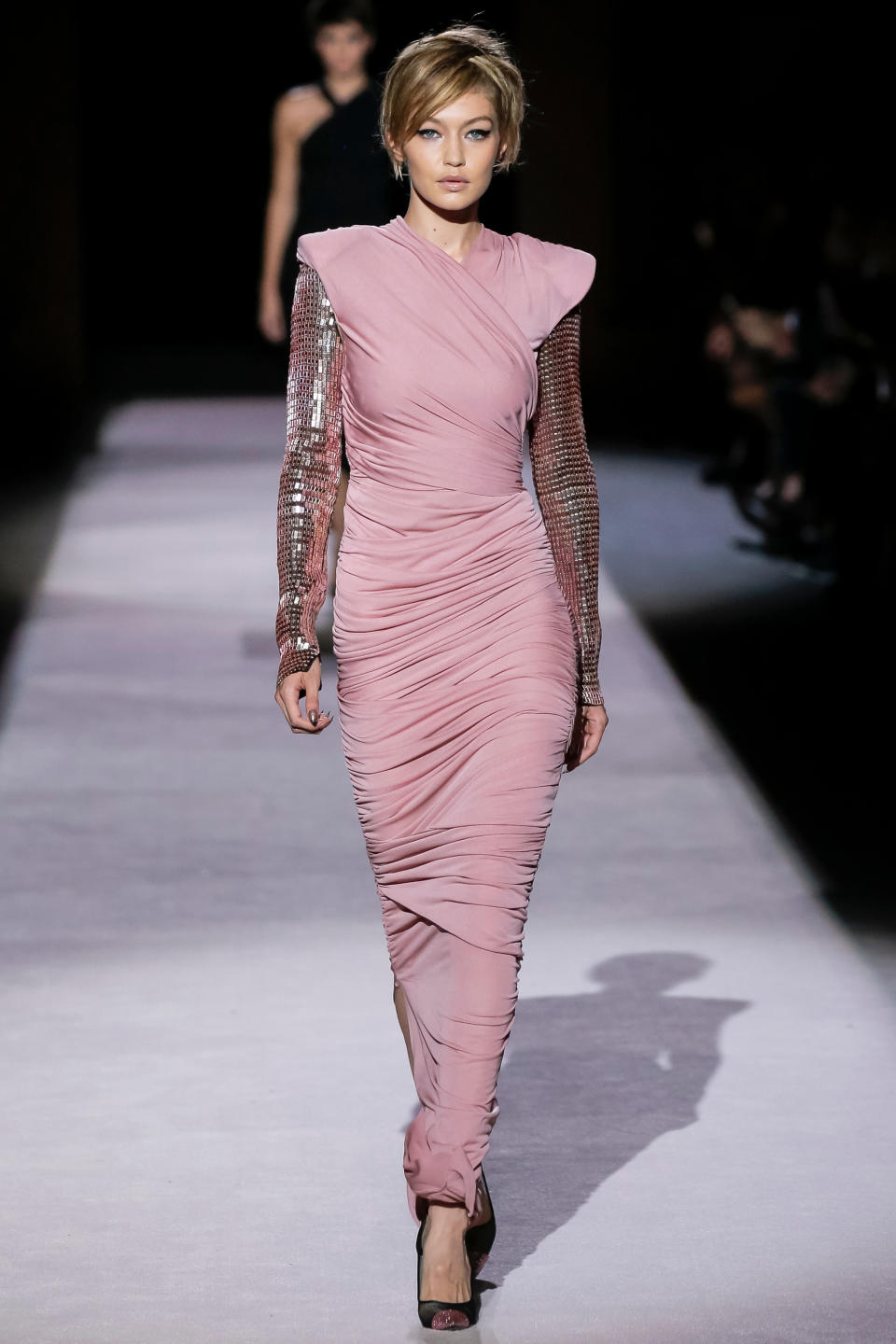<p>Hadid walked her first catwalk of SS18 NYFW for Tom Ford, looking like a blonde Barbie in a pink sheath dress.</p>