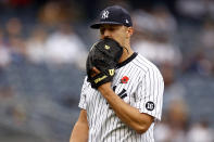 New York Yankees starting pitcher Jameson Taillon reacts while walking to the dugout during the fourth inning of a baseball game against the Tampa Bay Rays on Monday, May 31, 2021, in New York. (AP Photo/Adam Hunger)
