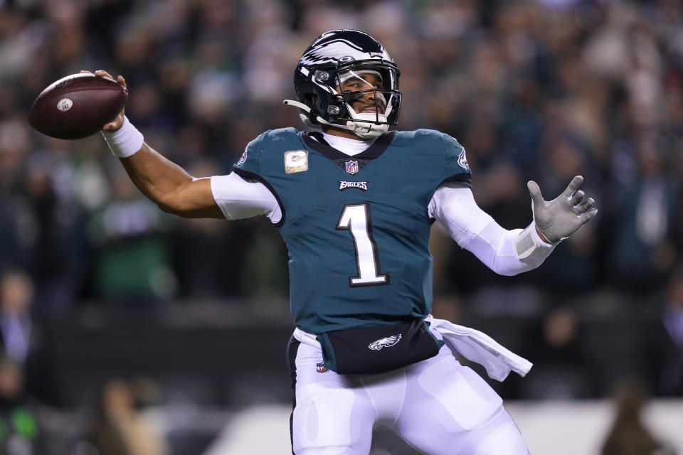 Philadelphia Eagles quarterback Jalen Hurts (1) throws a pass during the second half of an NFL football game against the Washington Commanders, Monday, Nov. 14, 2022, in Philadelphia. (AP Photo/Matt Rourke)