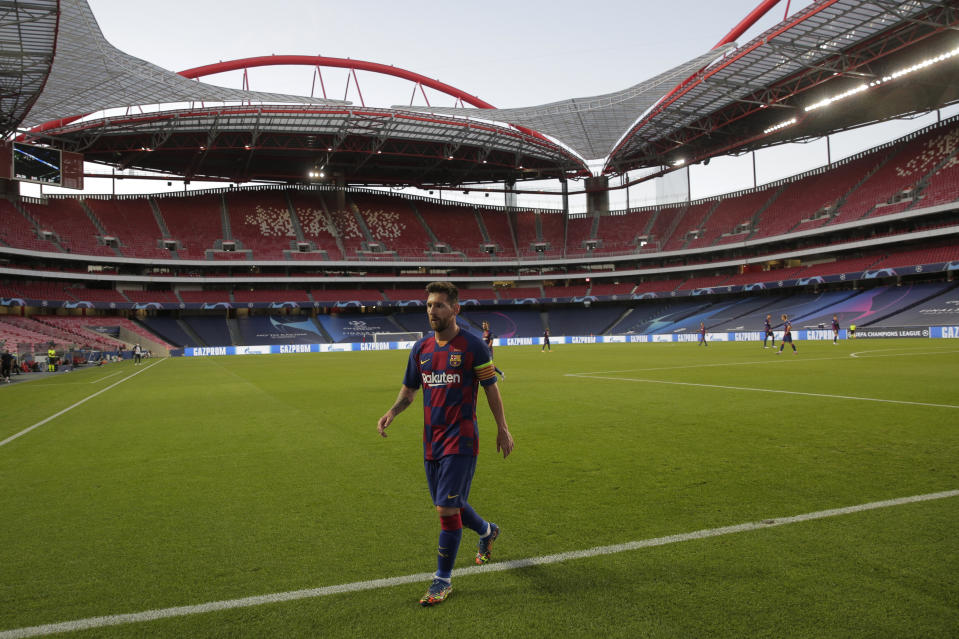 Barcelona's Lionel Messi walks win the pitch during the Champions League quarterfinal match between FC Barcelona and Bayern Munich at the Luz stadium in Lisbon, Portugal, Friday, Aug. 14, 2020. (AP Photo/Manu Fernandez/Pool)