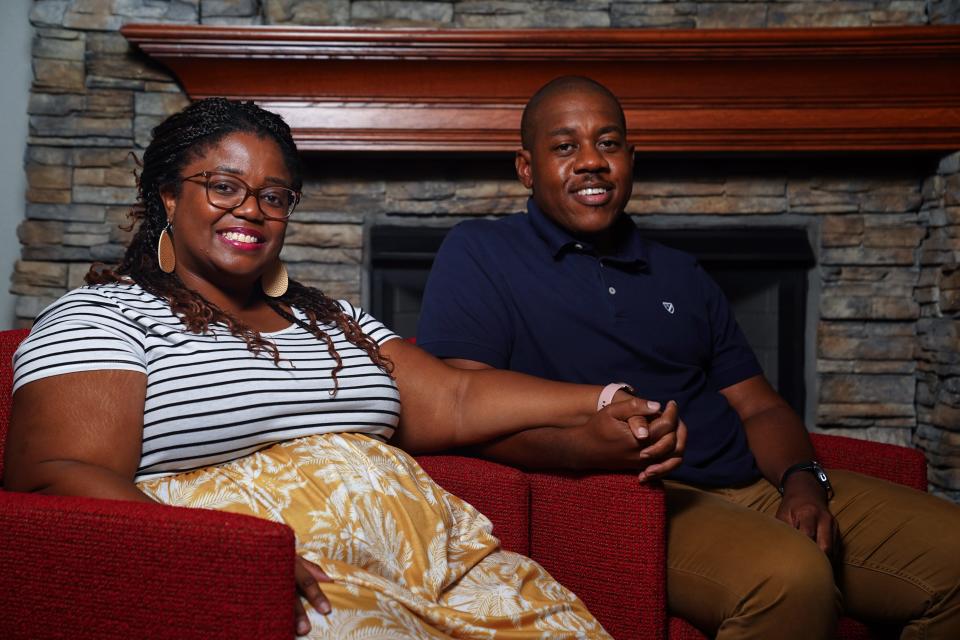 Erica and Aaron Parker, pictured, Tuesday, Aug. 31, 2021. They say the home they were trying to sell appraised higher when the removed all semblance that they were a Black family.