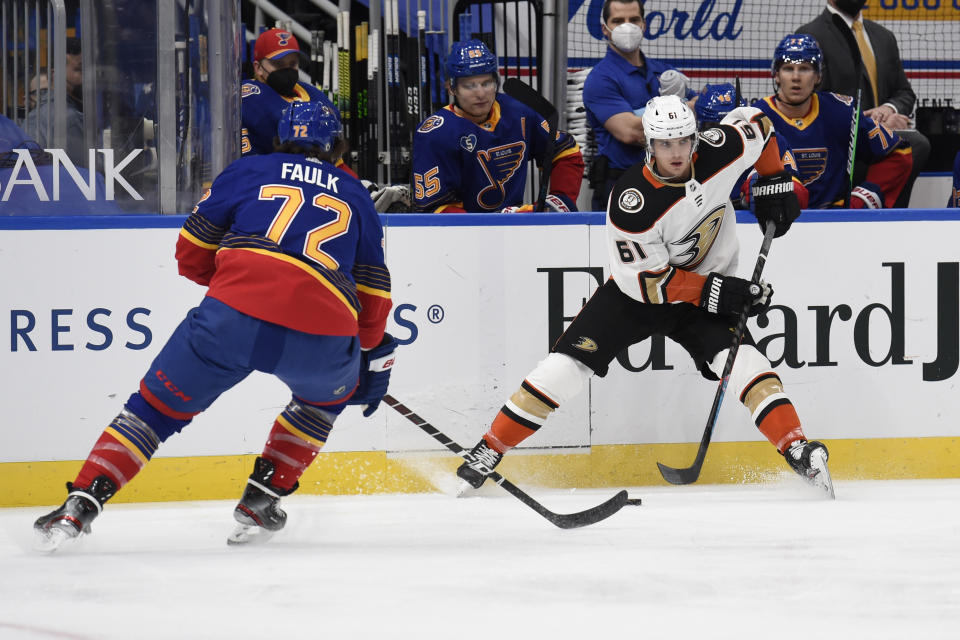 St. Louis Blues' Justin Faulk (72) defends against Anaheim Ducks' Troy Terry (61) during the first period of an NHL hockey game on Wednesday, May 5, 2021, in St. Louis. (AP Photo/Joe Puetz)