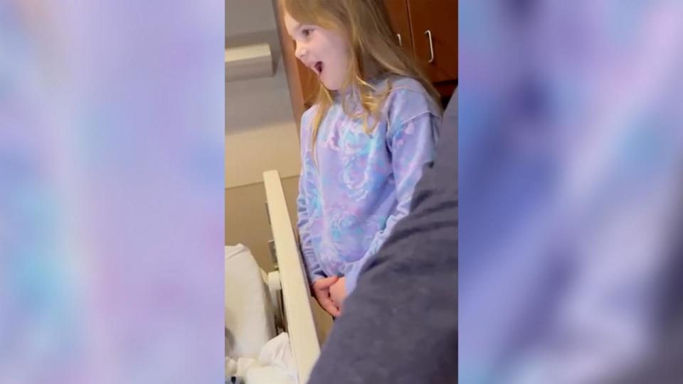 PHOTO: Sophia, 7, was captured reacting after seeing her younger sister being born. Sophia’s mom, Ashley Cunningham, shared her reaction in a now-viral TikTok video. (Courtesy of Carolyn Hughes)