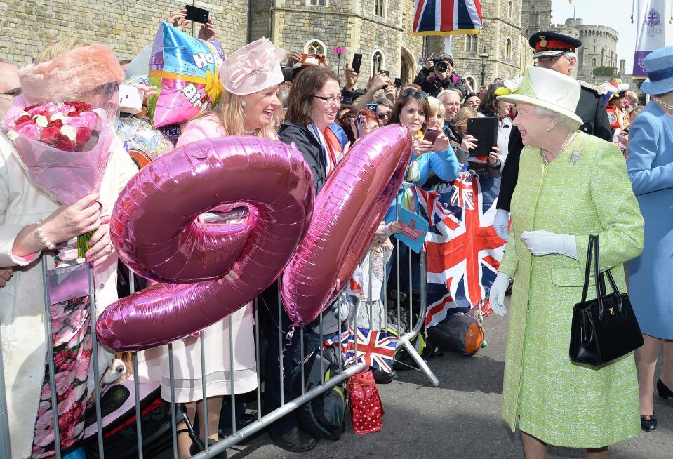 Queen Elizabeth II greets well-wishers on walkabout outside Windsor Castle on her 90th birthday, on April 21, 2016.