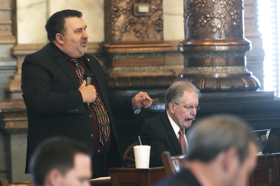 Kansas state Sen. Rob Olson, R-Olathe, criticizes a 93% pay increase for Kansas legislators that is due to take effect next year as the Senate debates a proposed spending bill, Friday, April 5, 2024, at the Statehouse in Topeka, Kan. Olson is upset because the bill does not contain a provision that he supports to delay the pay raise at least a year. (AP Photo/John Hanna)