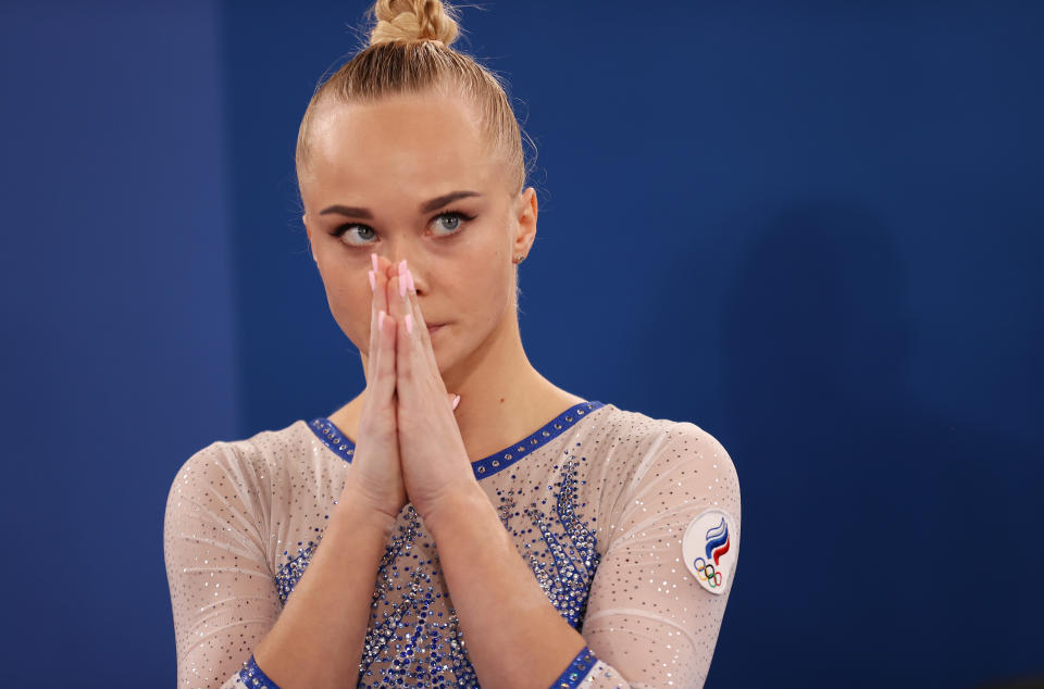 <p>TOKYO, JAPAN - JULY 27: Angelina Melnikova of Team ROC looks on during the Women's Team Final on day four of the Tokyo 2020 Olympic Games at Ariake Gymnastics Centre on July 27, 2021 in Tokyo, Japan. (Photo by Laurence Griffiths/Getty Images)</p> 