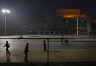 In this Tuesday Feb. 25, 2014 photo, North Koreans play roller skating at a skate park in Pyongyang, North Korea. (AP Photo/Vincent Yu)