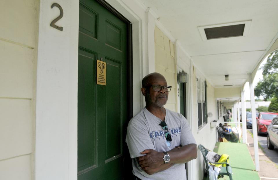 U.S. Coast Guard veteran Willie Williams stands outside the unit he used to live in at Liberty Lodge before he was evicted. Williams lives in Centerville. Veterans who are living at Liberty Lodge say their units are in disrepair.