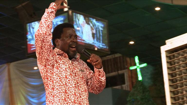 SCRIPT: His followers call him the prophet. Healing the sick with just a touch of his hand. T.B. Joshua is perhaps one of Nigeria's best-know televangelists and faith healers. His miracles, performed every week before tens of thousands at his Lagos megachurch -- and to countless more via the web and on his own TV channel -- keep the faithful enraptured -- and the funds coming in. Believers come from across the globe to hear his words and be cured from a range of mental and physical afflictions. Felix says that until this moment, he for years suffered from a degenerative bone disease: SOUNDBITE 1: Felix Fernandes, from Madrid [Spanish, 15 sec]: "I guess I felt a little nervous when he started healing me, I could feel the pressure lifting and when the prophet said you are free, I got up as if I had never had a sickness and I was cured." Religion is all-encompassing in Nigeria, a country split between a largely Muslim north and Christian south. Non believers like Bamidele are a rarity. He doubts the claims of the televangelists: SOUNDBITE 2: Bamidele Adeneye, member of Nigerian Humanist Movement [English, 29 sec]: "Somebody who has never been able to hear or speak starts speaking English after 35 years of being deaf and dumb and people believe this stuff and they drop money for this stuff, it's wrong… All we do is tell people that it is ok to ask questions, it's ok to question the things that you've believed in all your life." Ahmed says he was paid around $150 by a preacher to pretend to be a man who couldn't walk - and then be healed: SOUNDBITE 3: Ahmed Olayiwola, paid by a preacher to be healed [English, 24 sec]: "The pastor took olive oil, prayed to the olive oil and just put the olive oil on me. I started .. [makes gestures]... it's a lie but the congregation didn't know anything. They were thinking it's a miracle -- but on our side it was a business." At the synagogue, the cameras continue to roll, the miracles keep on coming and T.B Joshua reaches the climax of his sermon -- preaching a gospel of wealth: UPSOT: T.B. Joshua, televangelist and faith healer [English, 9 sec]: 'To rescue your money dollar, in the name of Jesus, to rescue your career, in the name of Jesus…' Praying for the promise of riches on earth as in heaven, here at least the disciples of T.B. Joshua are keeping the faith. SHOTLIST: LAGOS, NIGERIA, 27 OCT, 2013 SOURCE: AFPTV - VAR T.B. Joshua healing believers at the Synagogue Church of All Nations in Lagos -GV inside SCOAN -CU woman singing -TV TV screen -MS worshipers -Sequence woman throwing down crutches and walking -VAR people waiting to be healed, holding pieces of paper with their complaints -Felix Fernandes being 'healed' -SOUNDBITE 1: Felix Fernandes, from Madrid [Spanish, 15 sec] -GV Lagos -CU mosque, fades into CU church -VAR set up shots of Bamidele -SOUNDBITE 2: Bamidele Adeneye, member of Nigerian Humanist Movement [English, 29 sec] -VAR setup shots with Ahmed -SOUNDBITE 3: Ahmed Olayiwola, paid by a preacher to be healed [English, 24 sec] -GV SCOAN -MS bank of TV screens where Emmanuel TV is directed, inside SCOAN -PAN T.B. Joshua on stage -UPSOT: T.B. Joshua, televangelist and faith healer [English, 9 sec] -VAR worshipers at SCOAN /// --------------------------------