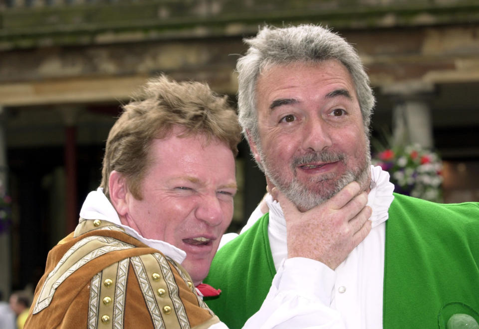 TV presenter and comedian Jim Davidson (left), as Dick Whittington, with co-star former snooker player turned commentator John Virgo, as Captain Creep, in Covent Garden, London, to publicise their pantomime in December at the London Apollo.  * ...in Hammersmith. The panto will run from December 22nd to January 21st 2001.