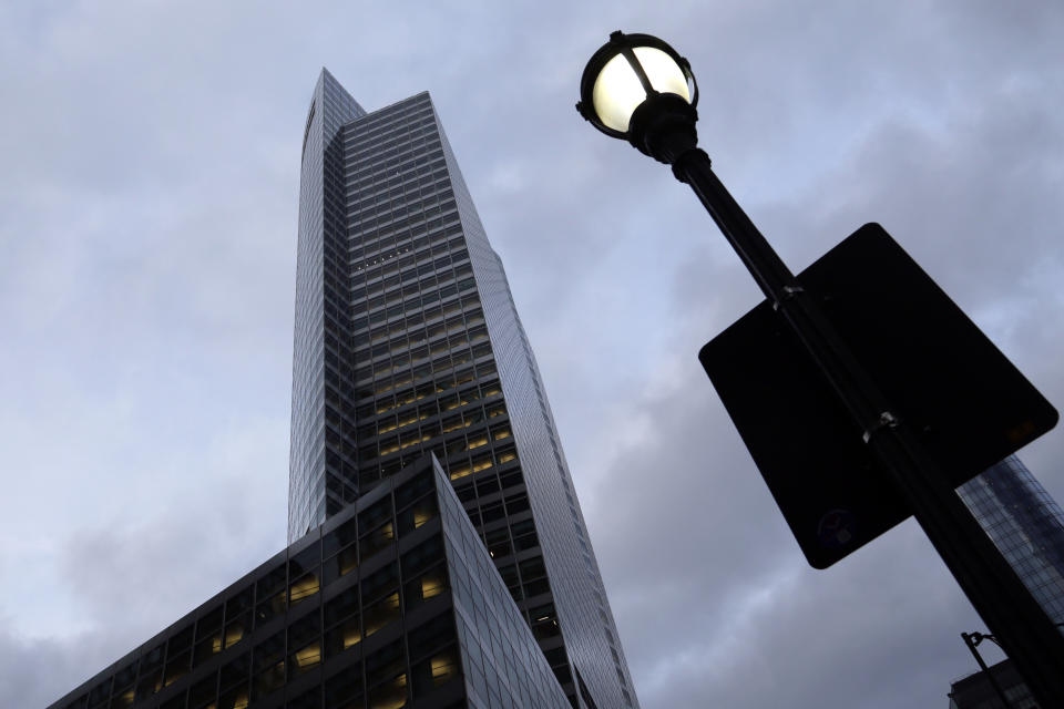 Lights are on inside and outside the world headquarters of Goldman Sachs in New York on Tuesday, Jan. 24, 2023. The storied investment bank has recently signaled a partial retreat from its efforts to build up a consumer banking business. (AP Photo/Peter Morgan)