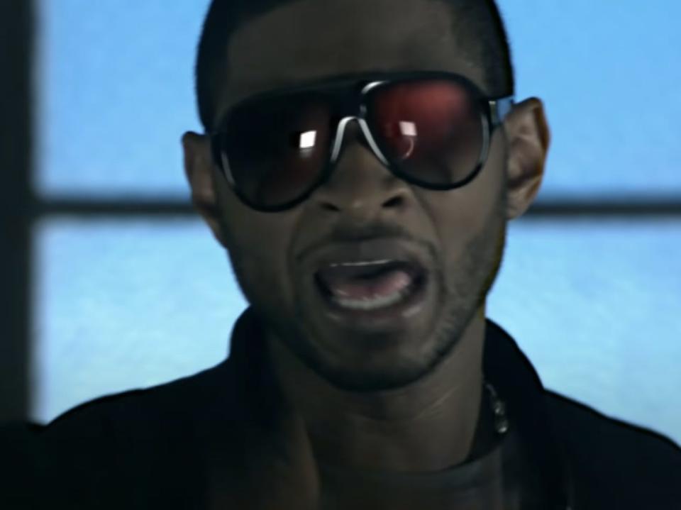 Usher in "DJ Got Us Fallin' In Love" music video