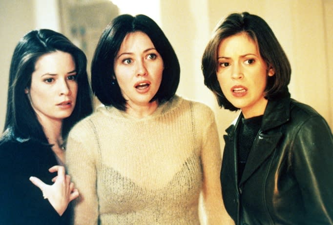 CHARMED, from left: Holly Marie Combs, Shannen Doherty, Alyssa Milano, 1998, 1998-2006. ph: Richard Cartwright /© The WB Television Network / Courtesy Everett Collection