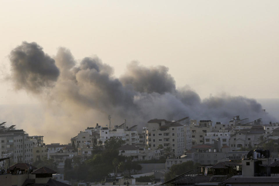 Smoke billows over Gaza City. (Abed Khaled / AP)