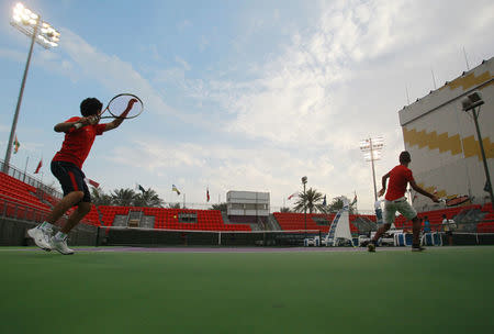 Alhassan Ishaq and Aiman Ahmed take part in a training session at Khalifa International Tennis and Squash Complex in Doha, Qatar, March 2, 2017. Picture taken March 2, 2017. REUTERS/Naseem Zeitoon