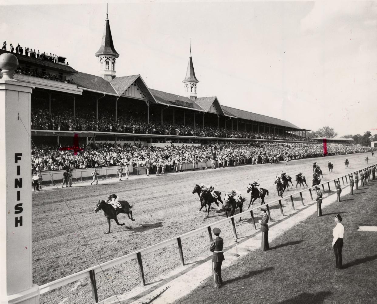 With blinkers in place, Decidedly and jockey Bill Hartack pulled away to a 2 1/4-length victory over Roman Line in the 1962 Kentucky Derby.