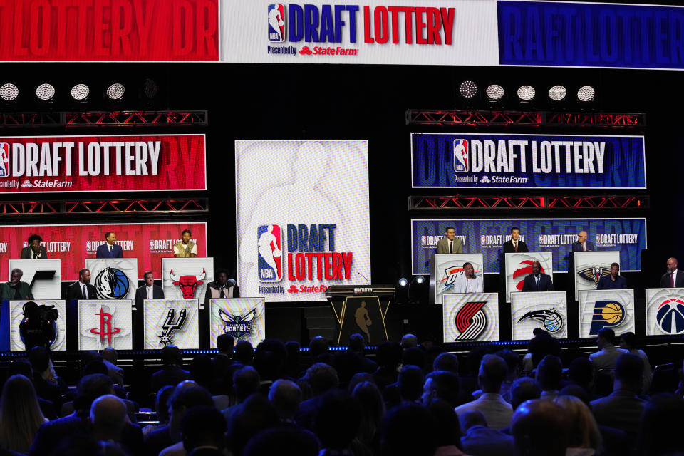 Team representatives attend the NBA basketball draft basketball draft lottery in Chicago, Tuesday, May 16, 2023. (AP Photo/Nam Y. Huh)