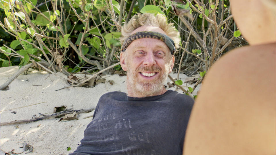 Mike White sits on the beach