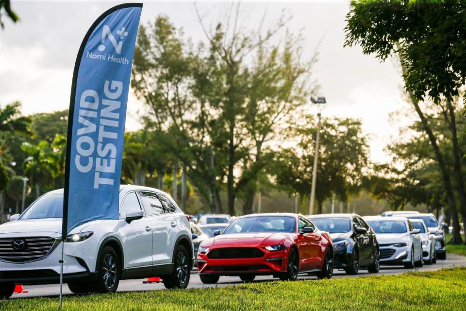 Cars line up to get COVID-19 tests at Tropical Park in December 2021. A Florida Auditor General report released Monday found Florida undercounted COVID-19 cases and deaths, did not report ethnic and racial details and its contact tracing was spotty in the early months of the pandemic.