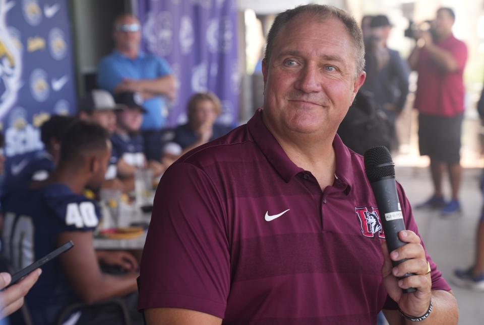 Hamilton Head Coach Michael Zdebski speaks to the pressduring Chandler Unified School Districtâ€™s Media Day with players from Arizona College Prep., Chandler, Hamilton, Basha, Casteel and Perry High Schools at Valle Luna Mexican Restaurant on Wednesday, Aug. 3, 2022.