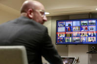 FILE - In this Tuesday, March 10, 2020 file photo, European Council President Charles Michel participates in a video conference call with EU leaders at the European Council building in Brussels. European Union leaders are preparing for a new virtual summit, which will take place Thursday, April 23, 2020, to take stock of the damage the coronavirus has inflicted on the lives and livelihoods of the bloc's citizens and to thrash out a more robust plan to revive their ravaged economies. (Stephanie Lecocq, Pool Photo via AP, File)