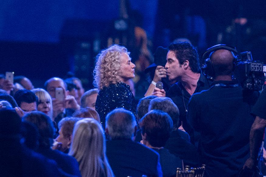 Pat Monahan of Train sings to Carole King at the MusiCares 2014 Person of the Year Tribute on Friday, Jan. 24, 2014 in Los Angeles. (Photo by Paul A. Hebert/Invision/AP)