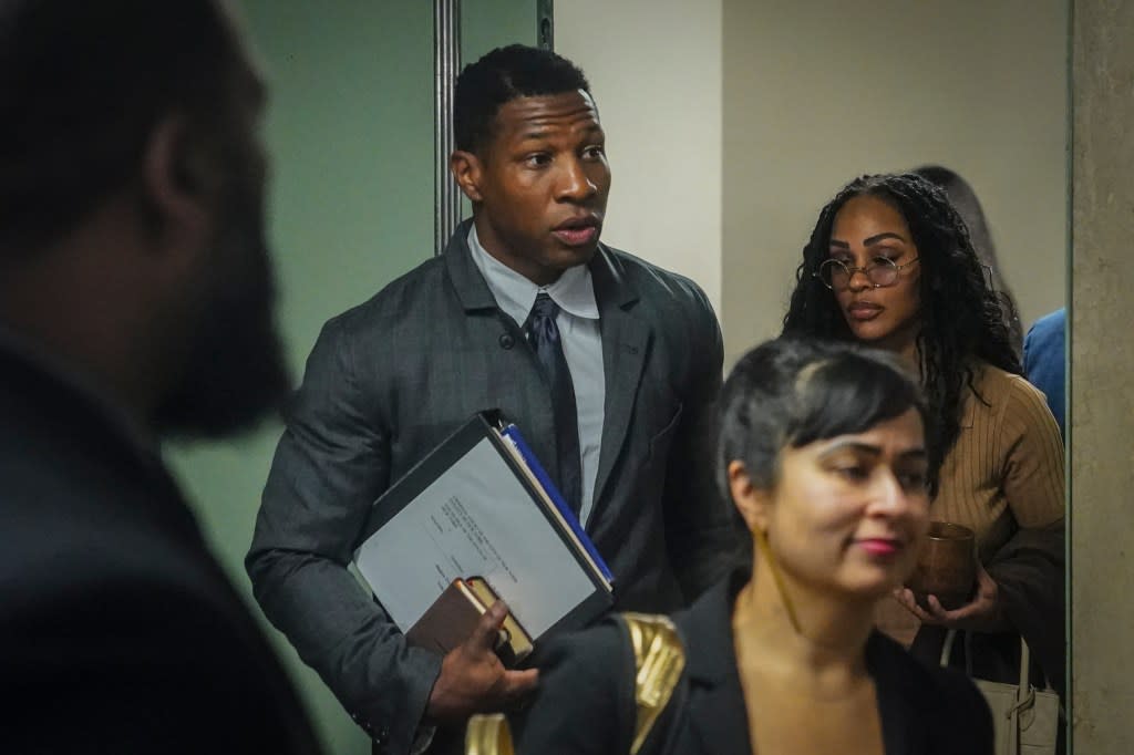 Actor Jonathan Majors, center, arrives at court for his domestic abuse trial, Tuesday, Dec. 5, 2023, in New York. (AP Photo/Bebeto Matthews)