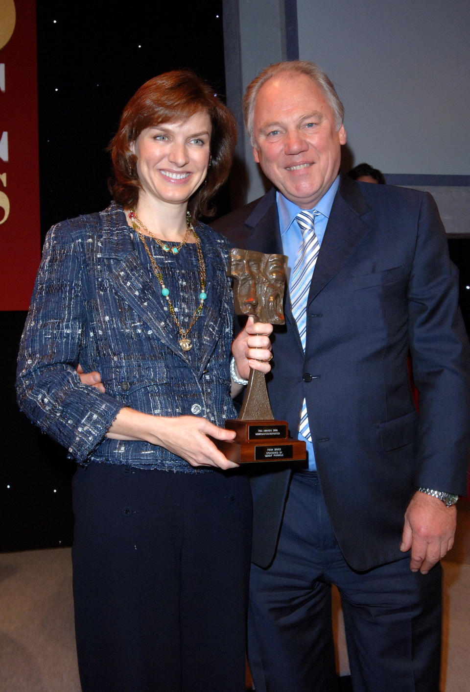 Peter Sissons and Fiona Bruce with her award for best TV Newscaster/Reporter, during the Television and Radio Industries Club (TRIC) Awards, at Grosvenor House, central London, Tuesday 7 March 2006. The awards honour performers and programmes and are voted for by radio and television personnel. PRESS ASSOCIATION Photo. Photo credit should read: Steve Parsons/PA   (Photo by Steve Parsons - PA Images/PA Images via Getty Images)