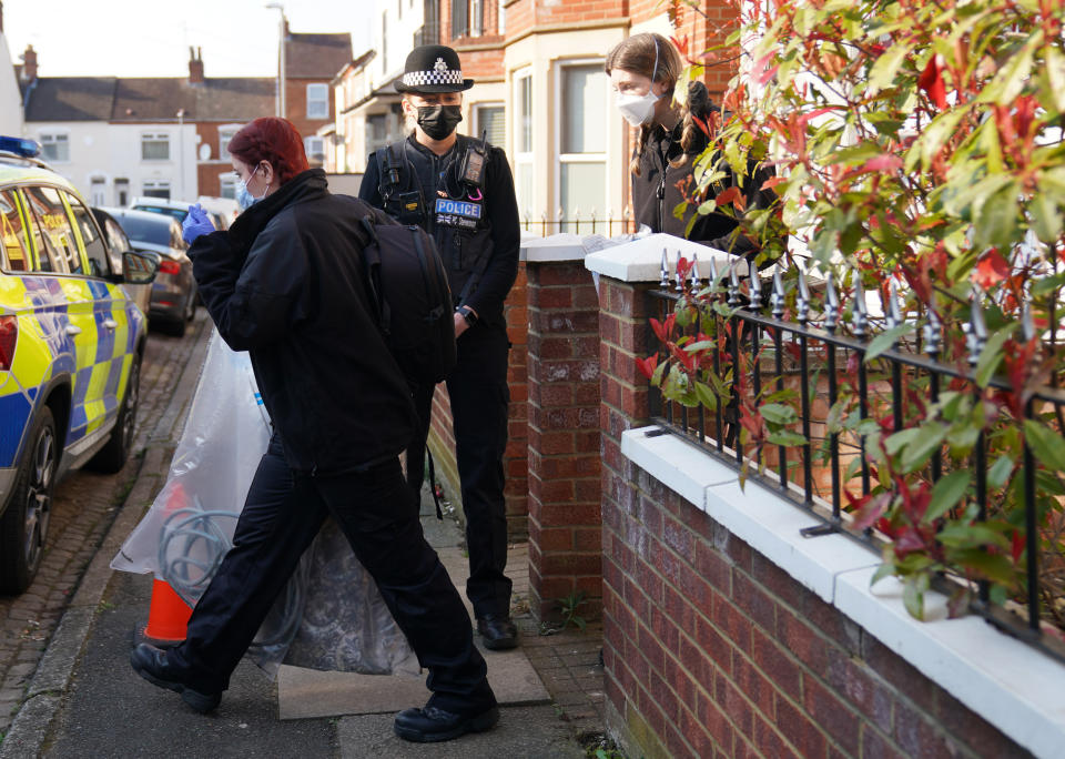 Items are removed from the property in Moore Street, Kingsley, Northampton following a discovery of a body in a rear garden. The remains are expected be taken to Leicester where they will be forensically examined by a Home Office pathologist but are believed to be that of a missing 42-year-old male. The investigation was mounted following the arrest of Fiona Beal, 48, at a hotel in Cumbria early on Wednesday morning. She has now been charged with murder. Picture date: Sunday March 20, 2022.