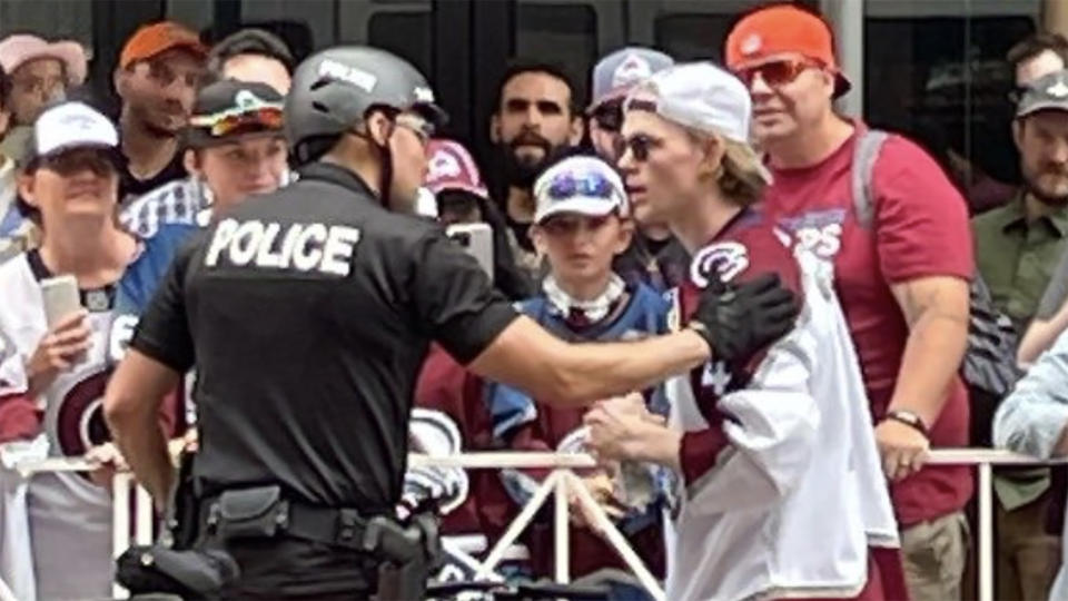 Bowen Byram found himself in a sticky situation at Thursday's Stanley Cup parade. (Screen shot via @droule13/Twitter)