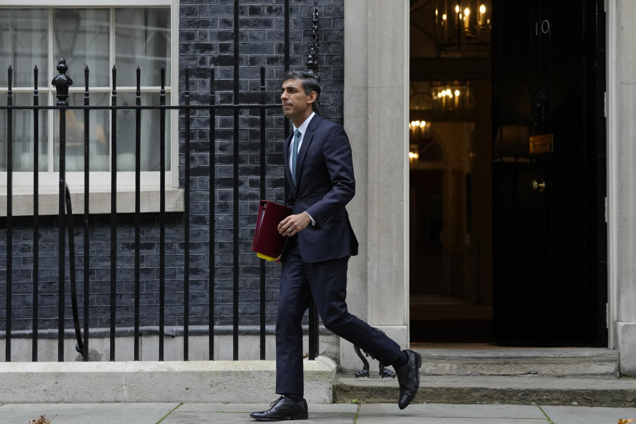 Britain's Prime Minister Rishi Sunak leaves 10 Downing Street for the House of Commons for his first Prime Minister's Questions in London, Wednesday, Oct. 26, 2022. Sunak was elected by the ruling Conservative party to replace Liz Truss who resigned. (AP Photo/Kirsty Wigglesworth)