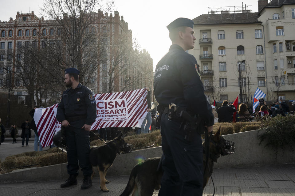 Police secures the area as antifascist protesters gather in Budapest, Saturday, Feb. 10, 2024. Hundreds of antifascist activists gathered in Hungary's capital on Saturday to oppose an annual commemoration held by far-right groups. (AP Photo/Denes Erdos)