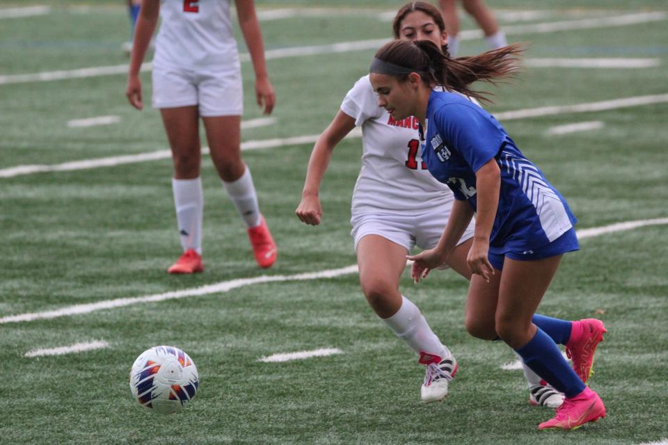 Cadence O'Hagan (right) is a senior outside back for the Hawthorne girls soccer team.