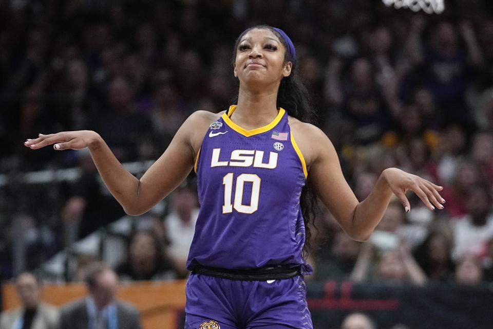LSU's Angel Reese celebrates after an NCAA Women's Final Four semifinals basketball game against Virginia Tech Friday, March 31, 2023, in Dallas. LSU won 79-72 to advance to the championship game on Sunday. (AP Photo/Darron Cummings)