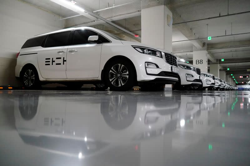 Vehicles of a ride-hailing service operator Tada are seen parked at its garage in Seoul