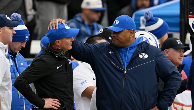 BYU coach Kalani Sitake puts his hand on the head of defensive coordinator Jay Hill as BYU and Oklahoma play at LaVell Edwards Stadium in Provo on Saturday, Nov. 18, 2023. Next up for BYU is a tough test at Oklahoma State.
