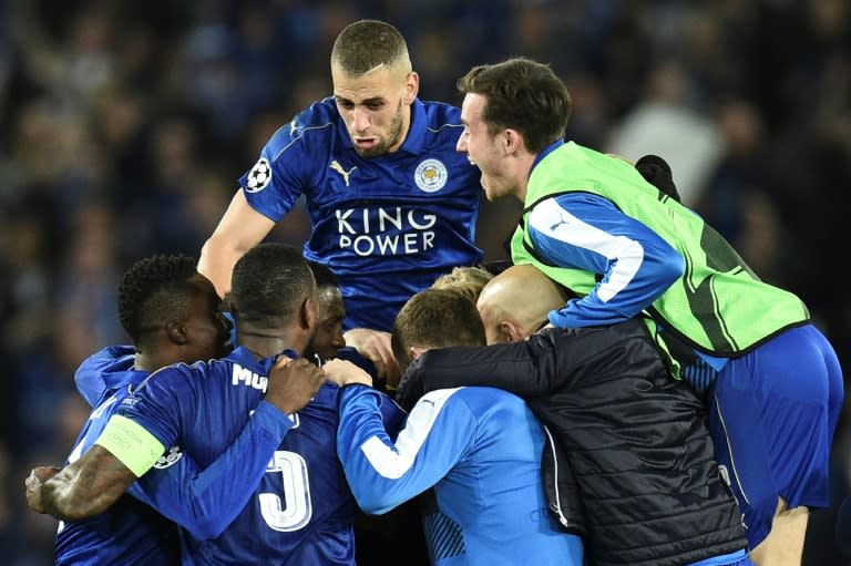 Leicester City players celebrate their dramatic Champions League victory against Sevilla on March 14, 2017