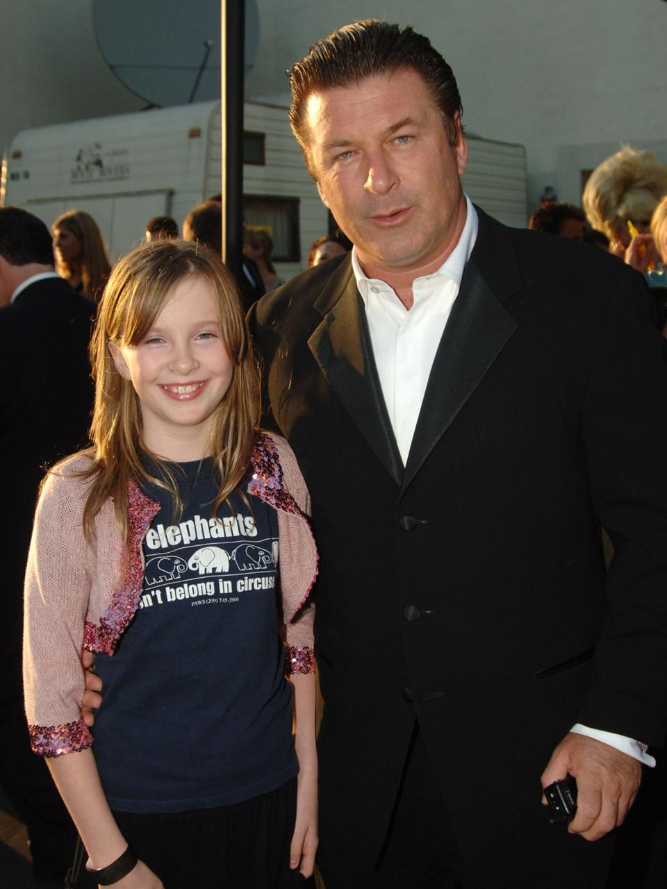 Alec Baldwin (R) and daughter Ireland Basinger-Baldwin at the 25th Anniversary Gala for PETA and Humanitarian Awards - Red Carpet at Paramount Pictures in Hollywood, California