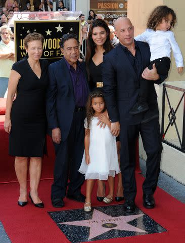 <p>Albert L. Ortega/Getty</p> Vin Diesel and his family as he is honored with a Star On The Hollywood Walk Of Fame held on August 26, 2013 in Hollywood, California.