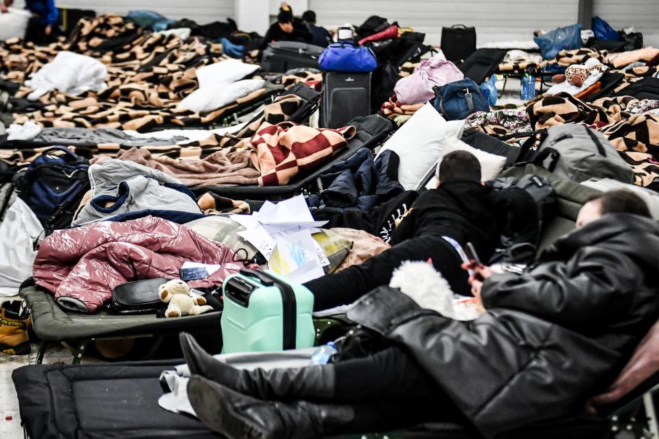 Thousands of Ukrainian refugees shelter in a converted shopping mall in Poland, near the border with Ukraine.