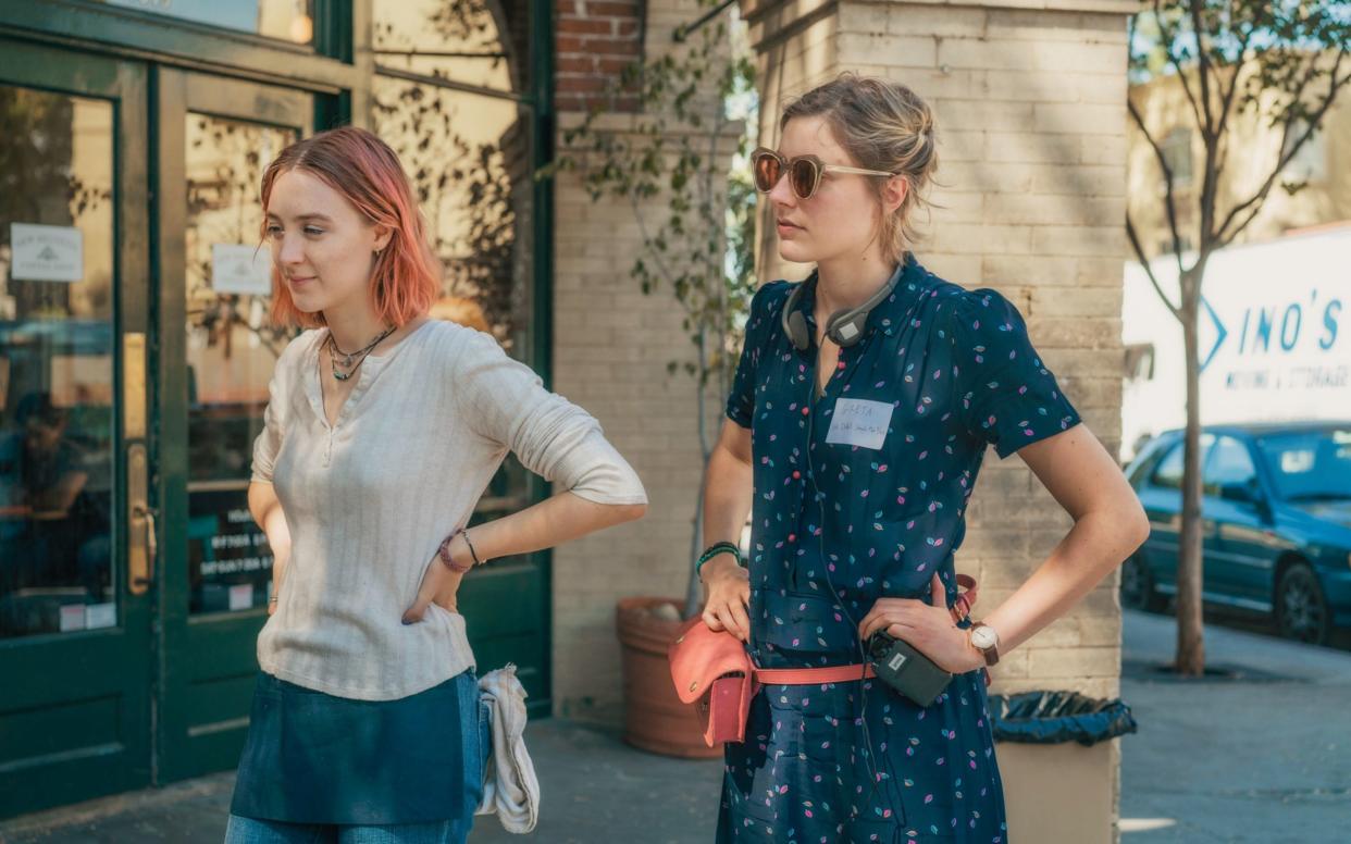 Greta Gerwig, right, on the set of Lady Bird with young star Saoirse Ronan - AP