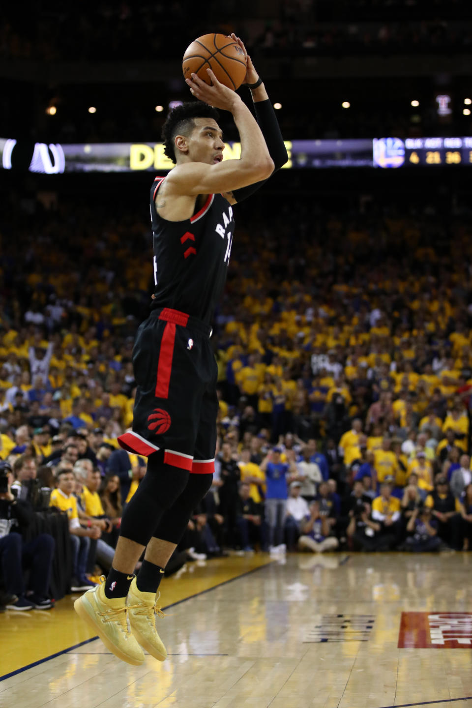 Danny Green #14 of the Toronto Raptors attempts a jump shot against the Golden State Warriors in the second half during Game 3 of the 2019 NBA Finals on June 5, 2019 in Oakland, California. (Photo by Ezra Shaw/Getty Images)