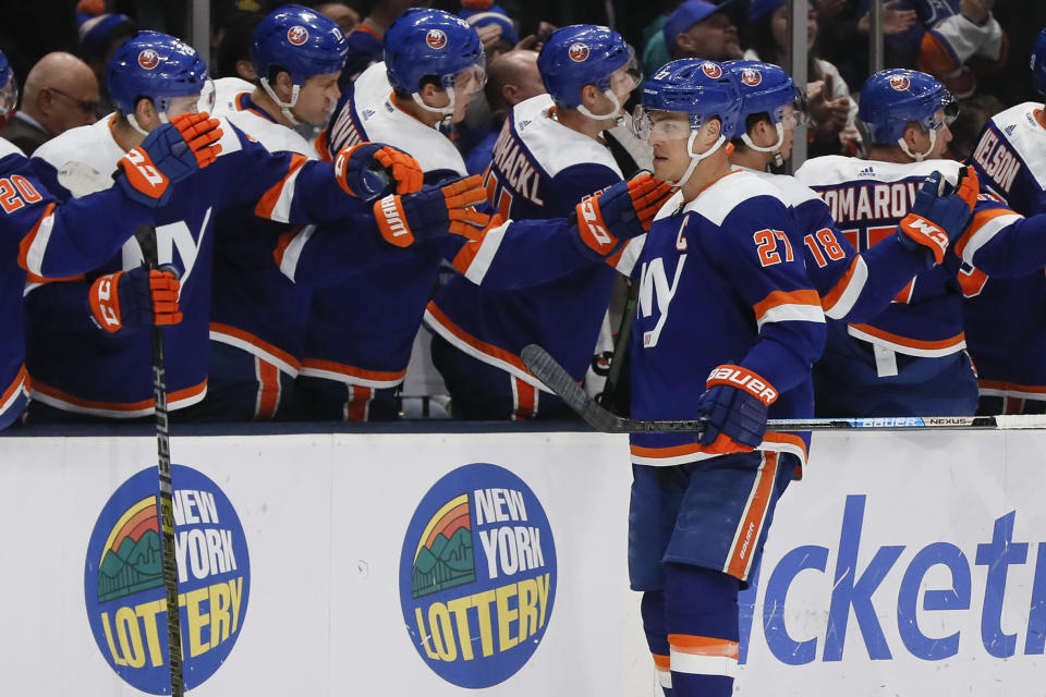 New York Islanders left wing Anders Lee (27) celebrates after his goal during the first period of an NHL hockey game against the San Jose Sharks, Sunday, Feb. 23, 2020, in Uniondale, NY. (AP Photo/John Minchillo)