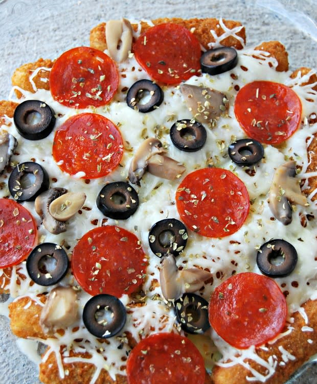 <p>Krista Marshall</p><p>Who needs dough when you can make pizza crust out of mozzarella sticks?</p><p><strong>Get the recipe: <a href="https://parade.com/842638/kristamarshall/cheese-stick-pizza/" rel="nofollow noopener" target="_blank" data-ylk="slk:Cheese Stick Pizza;elm:context_link;itc:0;sec:content-canvas" class="link ">Cheese Stick Pizza</a></strong></p>