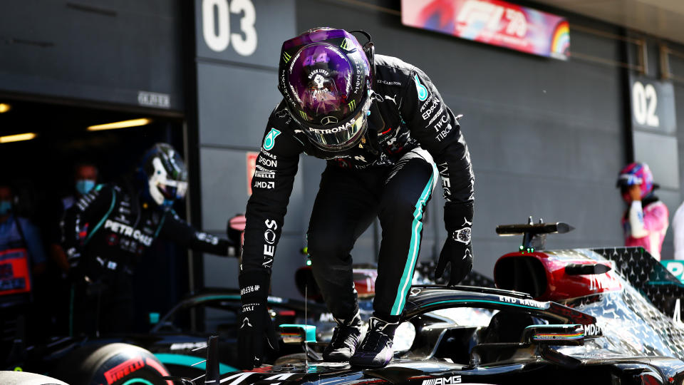 NORTHAMPTON, ENGLAND - AUGUST 01: Pole position qualifier Lewis Hamilton of Great Britain and Mercedes GP celebrates in parc ferme during qualifying for the F1 Grand Prix of Great Britain at Silverstone on August 01, 2020 in Northampton, England. (Photo by Dan Istitene - Formula 1/Formula 1 via Getty Images)