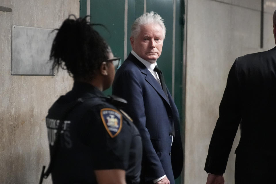 Musician Don Henley leaves Supreme Court during lunch break, Monday, Feb. 26, 2024, in New York. The trial surrounding pages of draft lyrics to "Hotel California" and other Eagles hits is set to feature a star witness: Henley. The Eagles co-founder is scheduled to testify Monday at the criminal trial of three collectibles professionals. (AP Photo/Mary Altaffer)