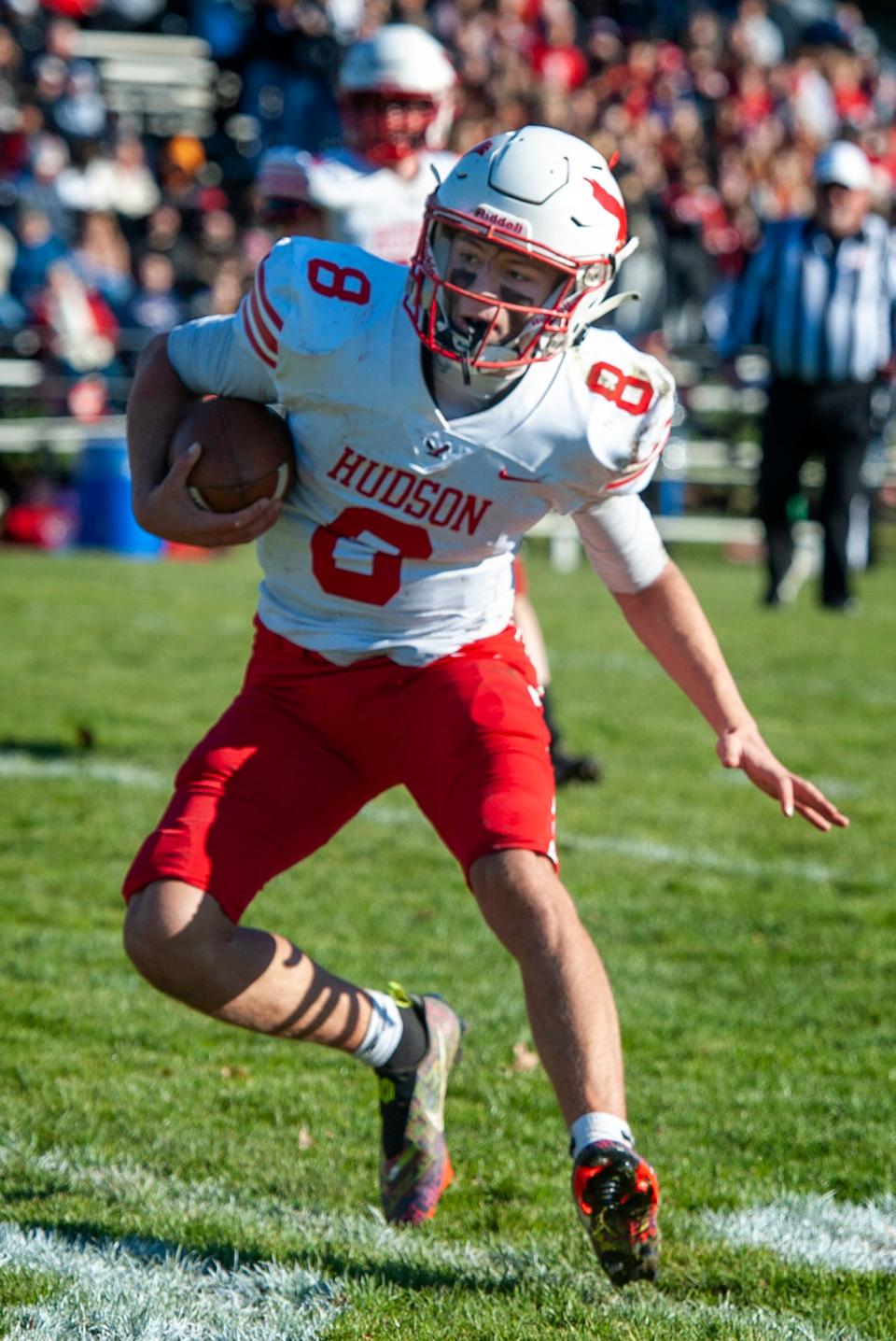 Hudson High School sophomore quarterback Jake Attaway on the run at Marlborough's Kelleher Field, Nov. 24, 2022.