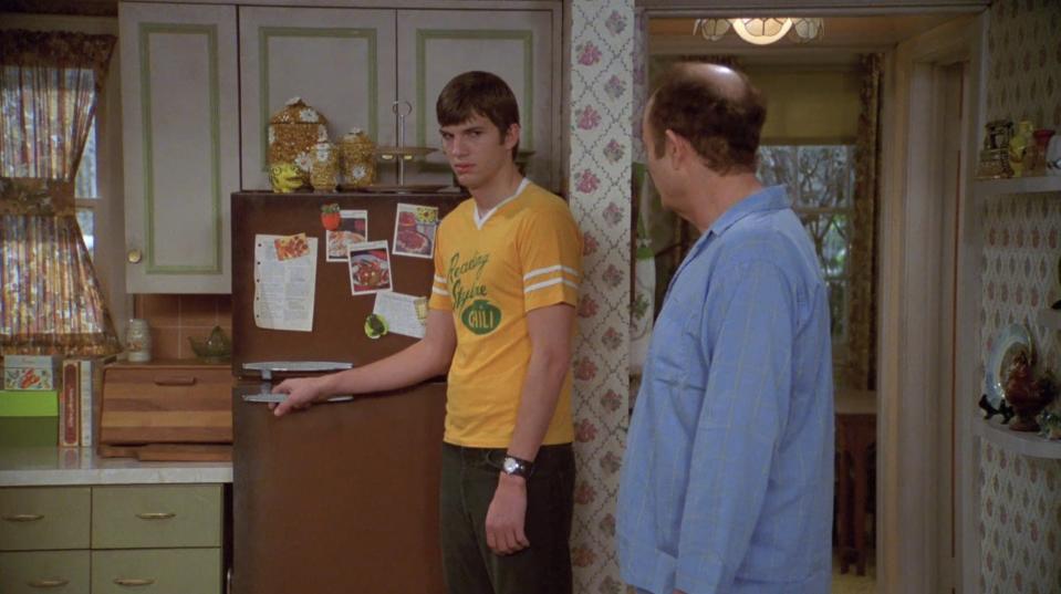 kelso with his hand glued to the forman's fridge in that 70s show