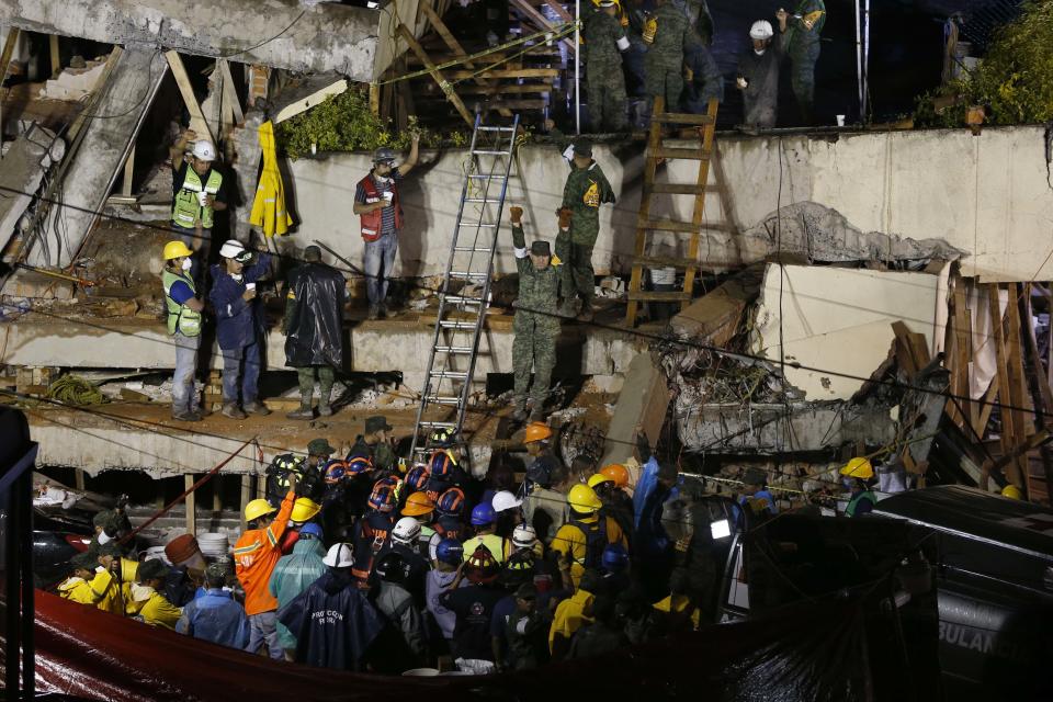 Rescue workers race to find survivors at collapsed Mexico City school