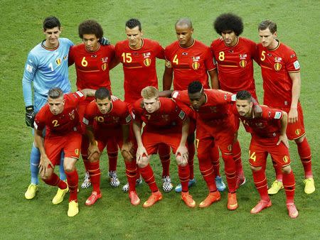 The Belgium team poses for a picture before their 2014 World Cup round of 16 game against the U.S. at the Fonte Nova arena in Salvador July 1, 2014. REUTERS/Ruben Sprich